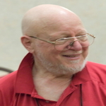 Jerry red shirt smiling
